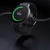 A close-up shot of a smartwatch charging, displaying 50% battery. Podgląd zdjęcia produktu