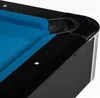 A close-up view of a corner of a pool table, showing the blue felt and black frame. Produktbild-Vorschau
