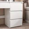 A close-up view of a white dresser with three drawers, part of a vanity table. Podgląd zdjęcia produktu