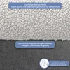 Close-up view of two different materials used in a dog bed, with text overlays describing their features. Produktbild-Vorschau