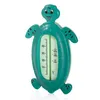A green turtle-shaped thermometer against a white background. Anteprima dell’immagine prodotto