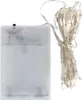 A battery pack with a string of lights attached. Voir les images du produit