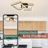 A modern kitchen interior with a ceiling light fixture shown both directly and reflected in a smartphone screen, with text overlay. Produktbild-Vorschau