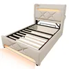A beige upholstered bed frame with integrated LED lighting is shown from a diagonal angle. Produktbild-Vorschau
