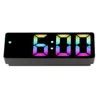 A digital alarm clock with a colorful display showing the time 6:00. Náhled obrázku produktu