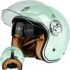 A mint green retro-style motorcycle helmet with a clear visor and brown interior lining, shown from a front-side angle with a smaller view of the back of the helmet. Anteprima dell’immagine prodotto