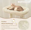 A cat is resting on a beige cat tree, with text overlays describing its features. Náhľad obrázku produktu