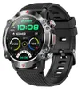 A close-up studio shot of a smartwatch with a black band and a silver and gray casing. Podgląd zdjęcia produktu