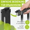 A hand is shown attaching a part of a baby gate to another part, with text overlays explaining features. Produktbild-Vorschau