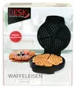 The image shows the packaging of a waffle maker, with a picture of the waffle maker and waffles on it. Produktbild-Vorschau