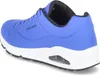 A side view of a blue Skechers sneaker with a white sole. Voir les images du produit