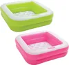 Two inflatable pools, one green and one pink, are shown against a white background. Produktbild-Vorschau