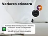 A close-up of a black smart tag with a signal icon, placed on white pillows, with a notification box below. Náhled obrázku produktu