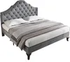 A grey upholstered bed with white bedding and a grey and white patterned throw blanket, shown against a white background. Náhled obrázku produktu