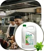 Two chefs in a kitchen, with a bottle of dish soap in the foreground. Náhled obrázku produktu