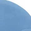 A close-up view of a blue fabric surface, likely part of a sofa or cushion. Náhľad obrázku produktu