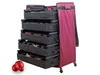 A storage organizer for Christmas ornaments with multiple drawers and wheels, shown against a white background. Some red ornaments are visible in the drawers and also placed in the foreground. Podgląd zdjęcia produktu