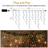 Diagram showing the dimensions and setup of LED string lights, with a lifestyle shot of the lights decorating a Christmas tree and garland. Produktbild-Vorschau