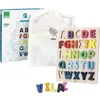 A wooden alphabet puzzle board with individual letter pieces, along with its packaging and a storage bag. Voir les images du produit