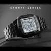 A close-up shot of a black digital sports watch with a metal band, displayed against a dark, textured surface. Náhled obrázku produktu