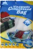 The image shows the packaging of vacuum compressed bags, with illustrations of folded clothes and towels before and after compression. Produktbild-Vorschau