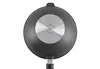 The bottom view of a black wok pan with a silver metal disc in the center. Produktbild-Vorschau