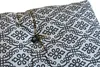 A close-up view of a tufted cushion with a floral pattern. Náhľad obrázku produktu