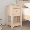 A wooden nightstand with a drawer and shelf is placed next to a bed. Anteprima dell’immagine prodotto