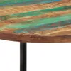 A close-up view of a round wooden table with a distressed finish, showing planks of wood with green and blue paint. Náhľad obrázku produktu