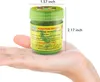 A hand holding a small green herbal inhaler with measurement indicators. Anteprima dell’immagine prodotto