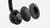 A close-up view of a black headset, showing the earcups and part of the headband. Náhľad obrázku produktu