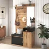 A hallway with a compact wardrobe unit featuring a mirror, bench, and storage. Produktbild-Vorschau