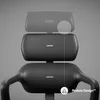 Close-up view of the headrest and upper backrest of an ergonomic office chair, highlighting its modular design. Náhled obrázku produktu