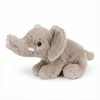 A plush toy elephant is shown sitting on a white background. Voir les images du produit