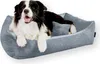 A border collie dog is lying on a gray corduroy dog bed. Produktbild-Vorschau