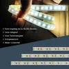 A hand holding a flexible LED light strip, with text listing its features and smaller strips shown below. Náhled obrázku produktu