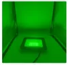 A green LED floodlight is shown in a green illuminated environment, possibly a photo studio or a specially set up scene. Produktbild-Vorschau