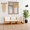 An outdoor seating area with a sofa, window, and plant. Náhľad obrázku produktu
