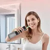 Douche buccale portable - sans fil - pour les soins Voir les images du produit 15