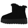 A side view of a black platform boot with faux fur trim. Produktbild-Vorschau