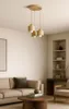 A modern living room with a sofa, coffee table, and a bookshelf. Produktbild-Vorschau