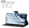 A phone case with a phone inside, showing its stand function. Anteprima dell’immagine prodotto