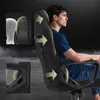 A man sitting in a gaming chair, with diagrams highlighting the chair's features. Produktbild-Vorschau
