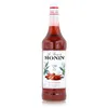 A bottle of Monin Cinnamon syrup against a white background. Podgląd zdjęcia produktu