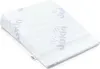 A white wedge pillow with a repeating purple pattern of the brand name 'Jukki' and small paper airplanes. Produktbild-Vorschau