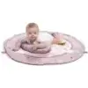 A baby is lying on a pink play mat. Produktbild-Vorschau