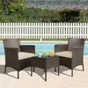 A patio furniture set with two chairs and a table is placed next to a swimming pool, with a white picket fence and trees in the background. Produktbild-Vorschau