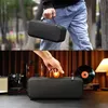 The image is a collage showing a person holding a black carrying case in two different settings: outdoors and indoors with a desk setup. Náhled obrázku produktu