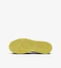 The bottom view of a yellow sneaker sole. Podgląd zdjęcia produktu