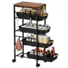 A black metal kitchen cart with a wooden top and four baskets, filled with various food items and kitchenware, shown against a white background. Voir les images du produit
